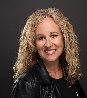 Kim Orlando of SheBuysTravel.com